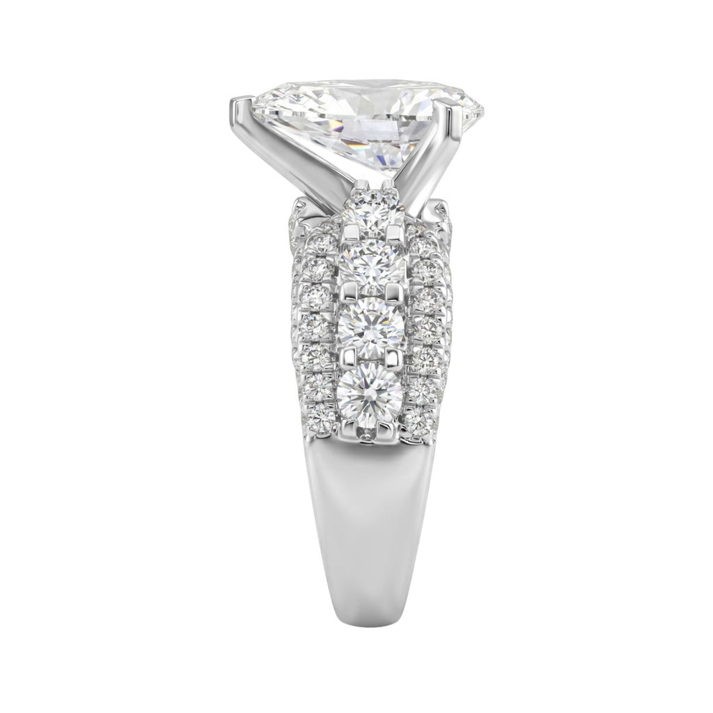LADIES RING 5 1/4CT ROUND/ PEAR DIAMOND 14K WHITE GOLD (CENTER STONE PEAR DIAMOND 3CT )