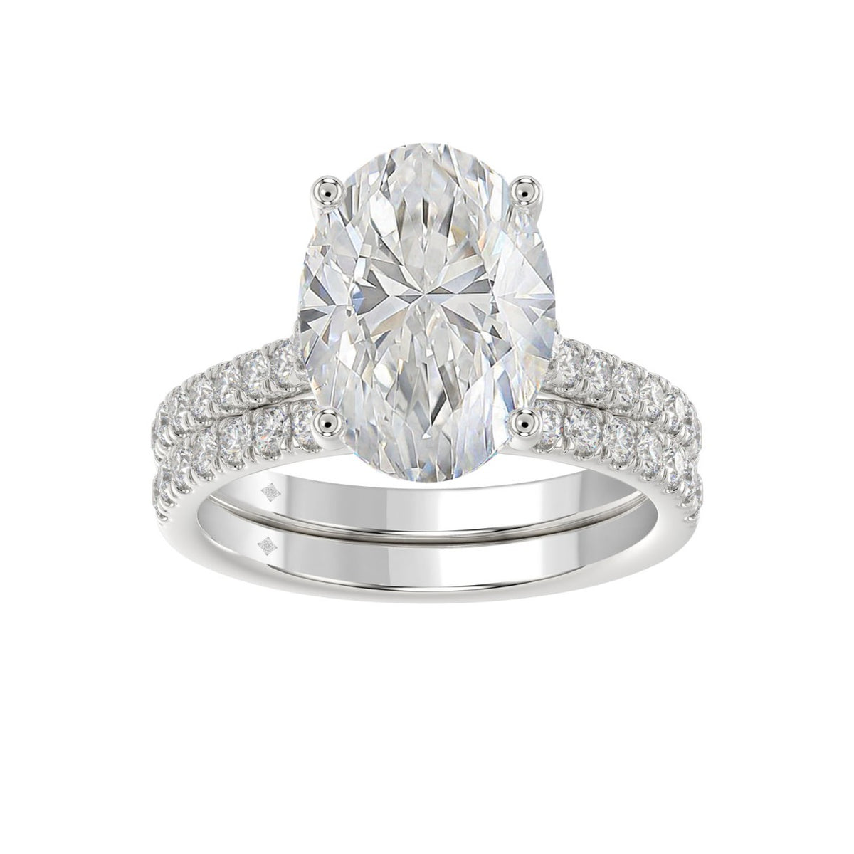 14K WHITE GOLD 4 1/2CT ROUND/OVAL DIAMOND LADIES BRIDAL SET (CENTER STONE OVAL DIAMOND 4.00CT)