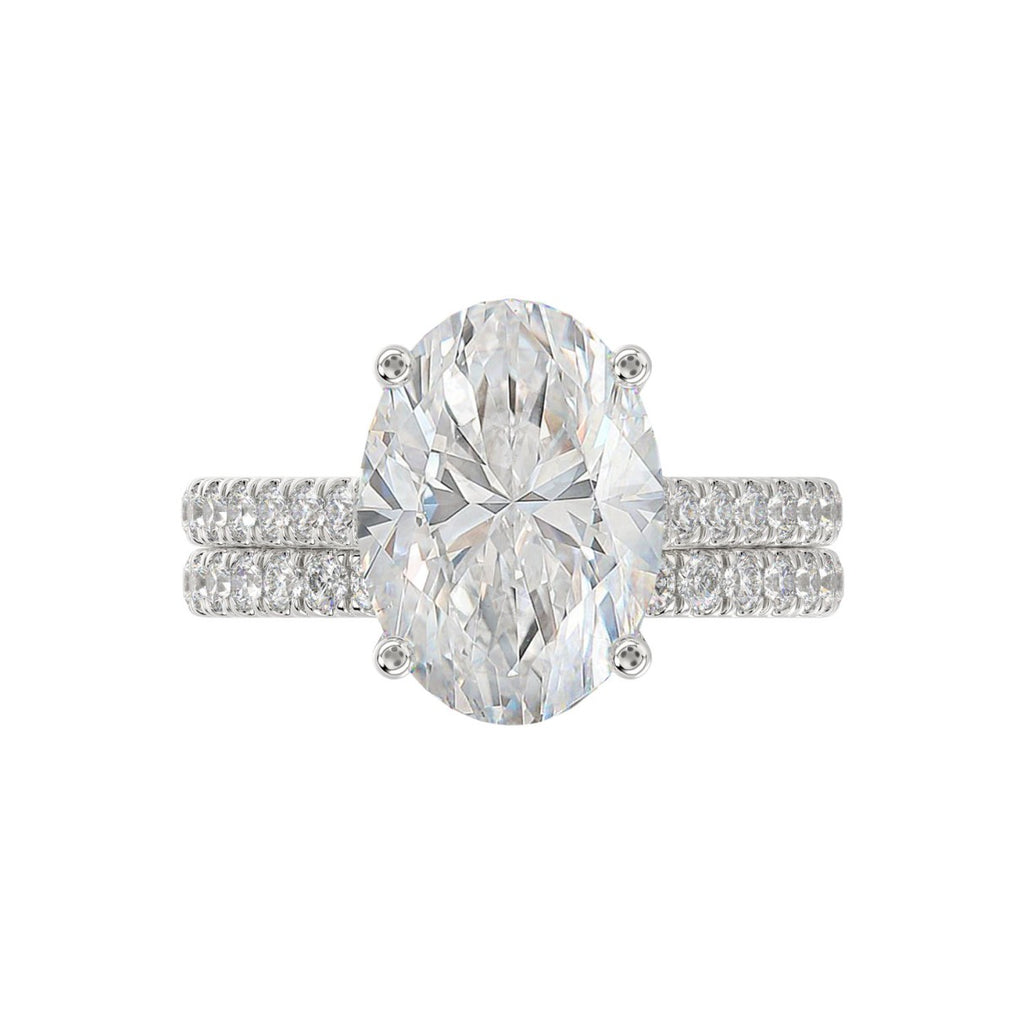 14K WHITE GOLD 4 1/2CT ROUND/OVAL DIAMOND LADIES BRIDAL SET (CENTER STONE OVAL DIAMOND 4.00CT)