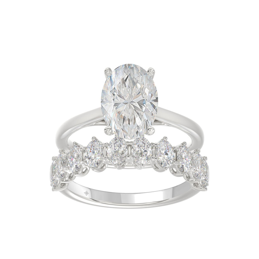 14K WHITE GOLD 4 1/2CT ROUND/OVAL DIAMOND LADIES BRIDAL SET (CENTER STONE OVAL DIAMOND 3.00CT)