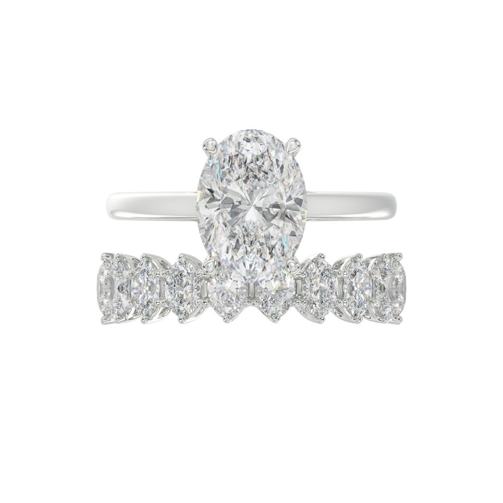 14K WHITE GOLD 4 1/2CT ROUND/OVAL DIAMOND LADIES BRIDAL SET (CENTER STONE OVAL DIAMOND 3.00CT)