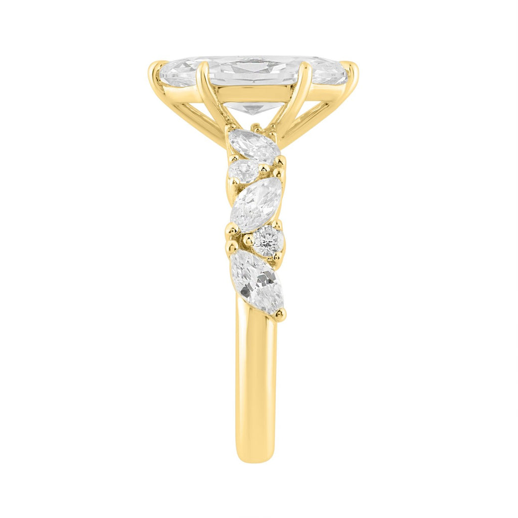 14K YELLOW GOLD 2 3/4CT ROUND/MARQUISE DIAMOND LADIES RING (CENTER STONE MARQUISE DIAMOND 2CT)