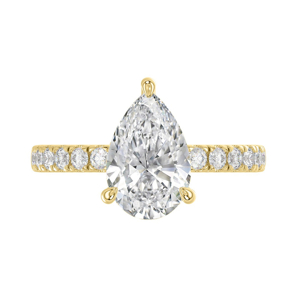 14K YELLOW GOLD 3 1/2CT ROUND/PEAR DIAMOND LADIES RING (CENTER STONE PEAR DIAMOND 3CT)